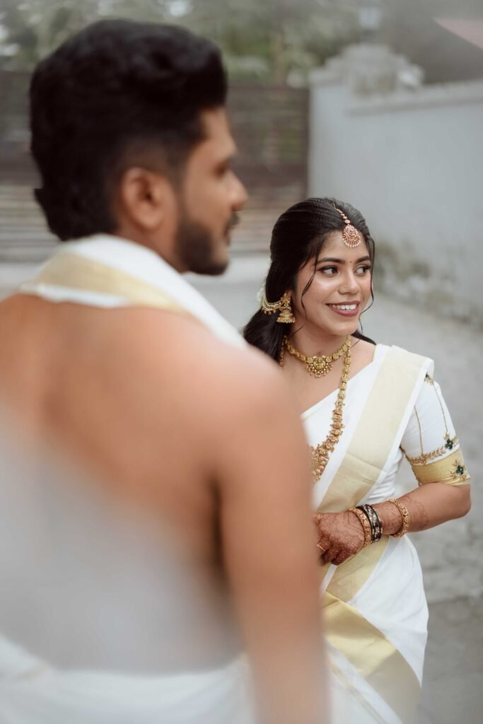 Professional wedding photographer capturing emotional moment
